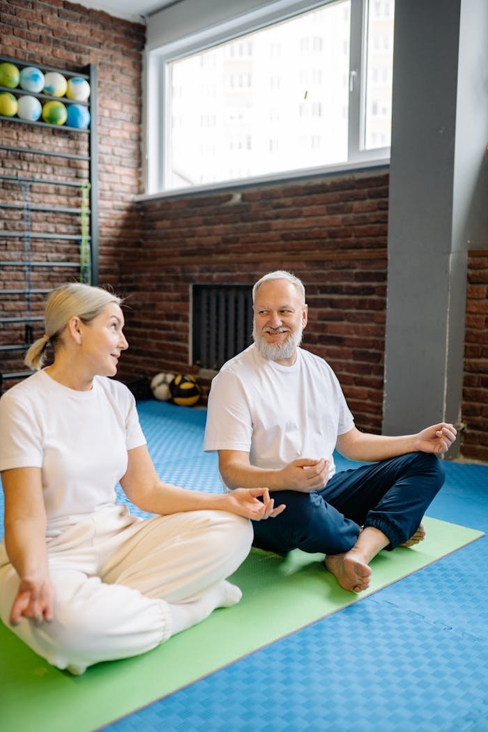An Elderly Couple Meditating Together